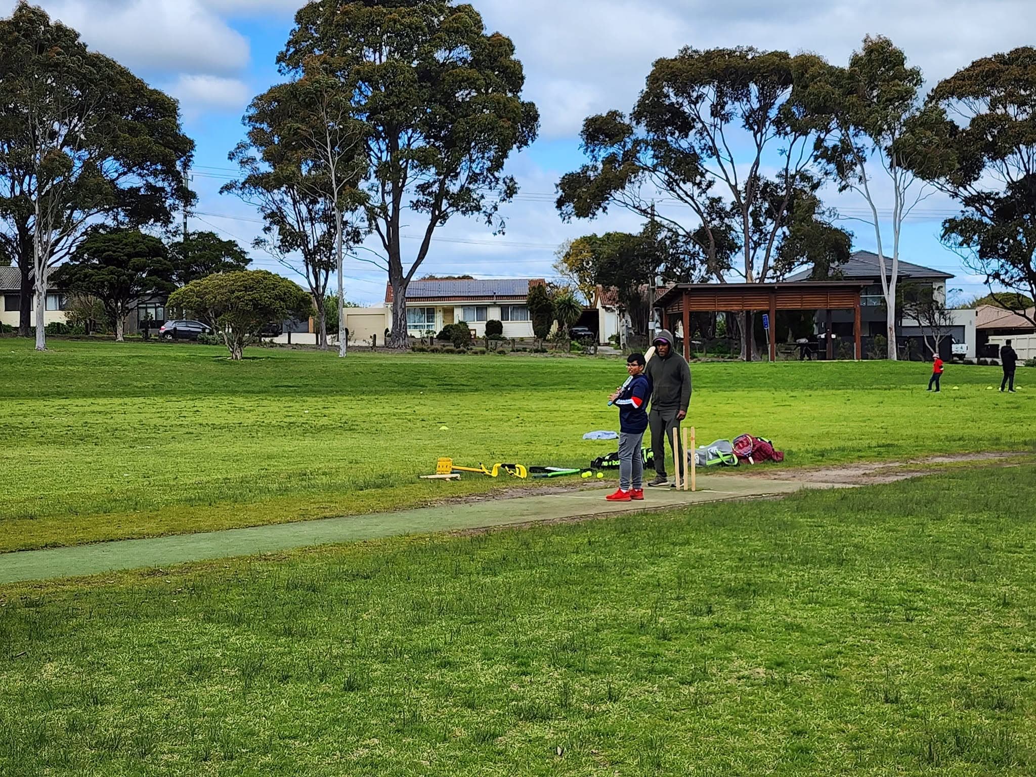 Junior batting session with coaching support
