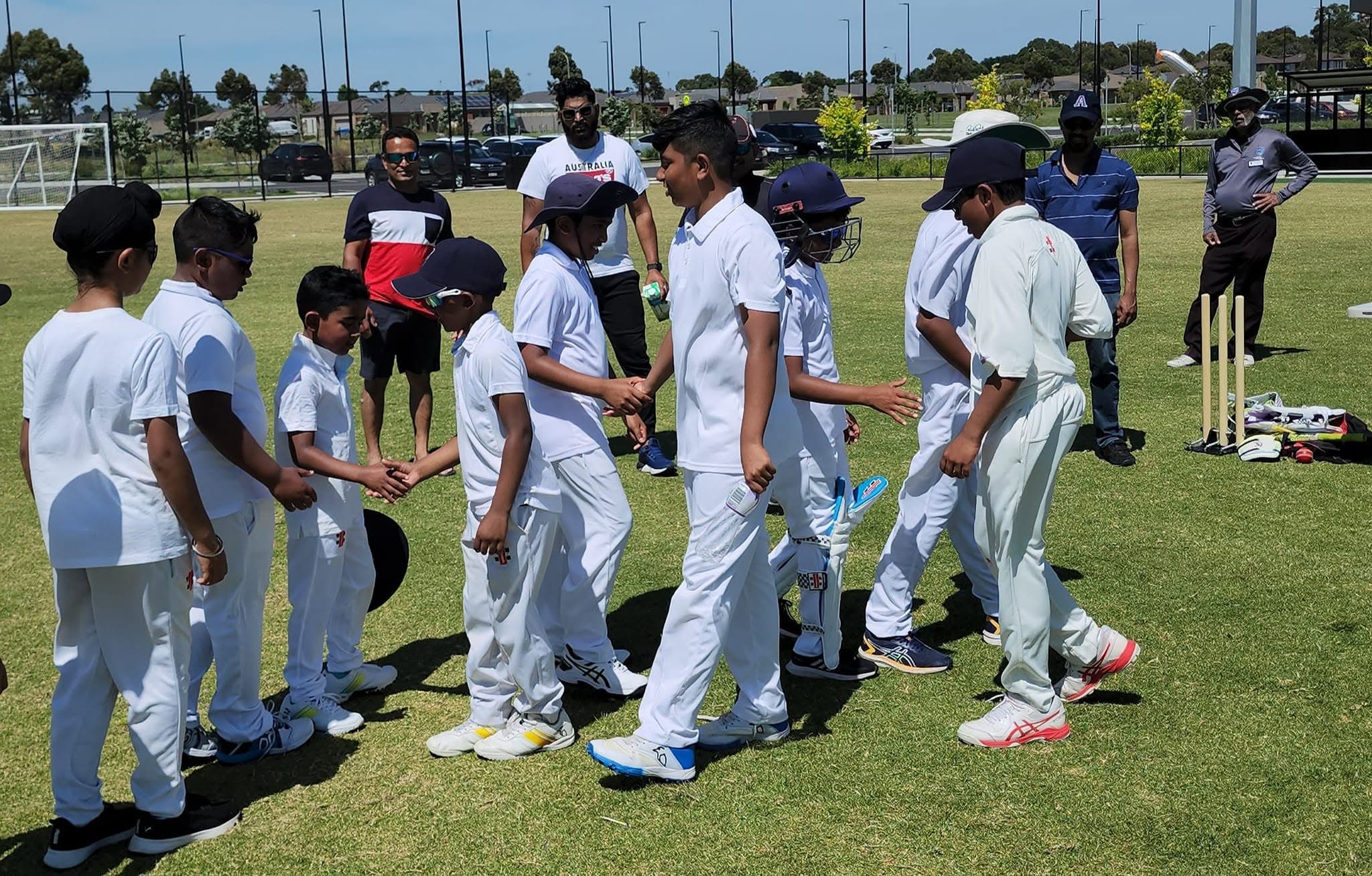 Junior players shaking hands after a match